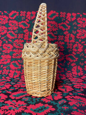 Beautiful hand-woven basket decorated with winter greenery and berries. Perfect for the Epiphany water blessing or as a festive home accent. Natural materials, lightweight, and unique design.