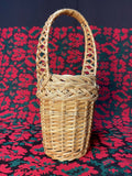 Beautiful hand-woven basket decorated with winter greenery and berries. Perfect for the Epiphany water blessing or as a festive home accent. Natural materials, lightweight, and unique design.