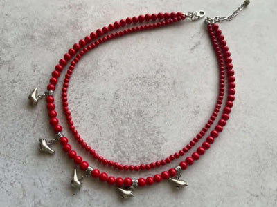 Red necklace with little birds  