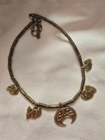 Metal hand made necklace with birds