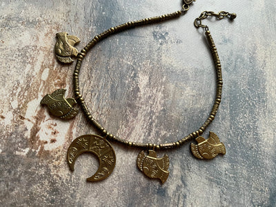 Metal hand made necklace with birds