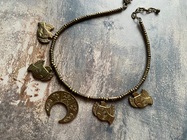 Metal hand made necklace with birds