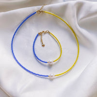 Set of blue and yellow jewelry with Swarovski pearls