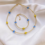 Set of blue and yellow jewelry