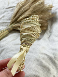 Straw weaving rattle toy. Handmade. Make sounds